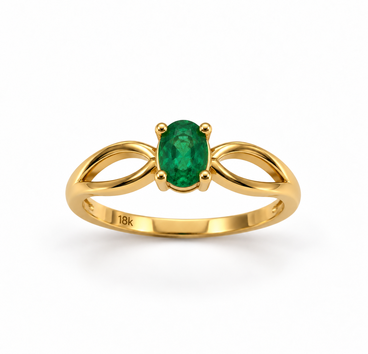 Anillo de oro de 18 kilates con esmeralda ovalada